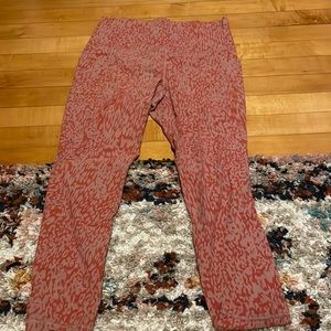 Athleta patterned leggings with pockets size medium